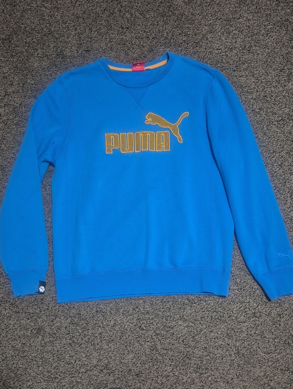 Puma Men's Bright Blue Crewneck Sweatshirt with Gold Logo Accent